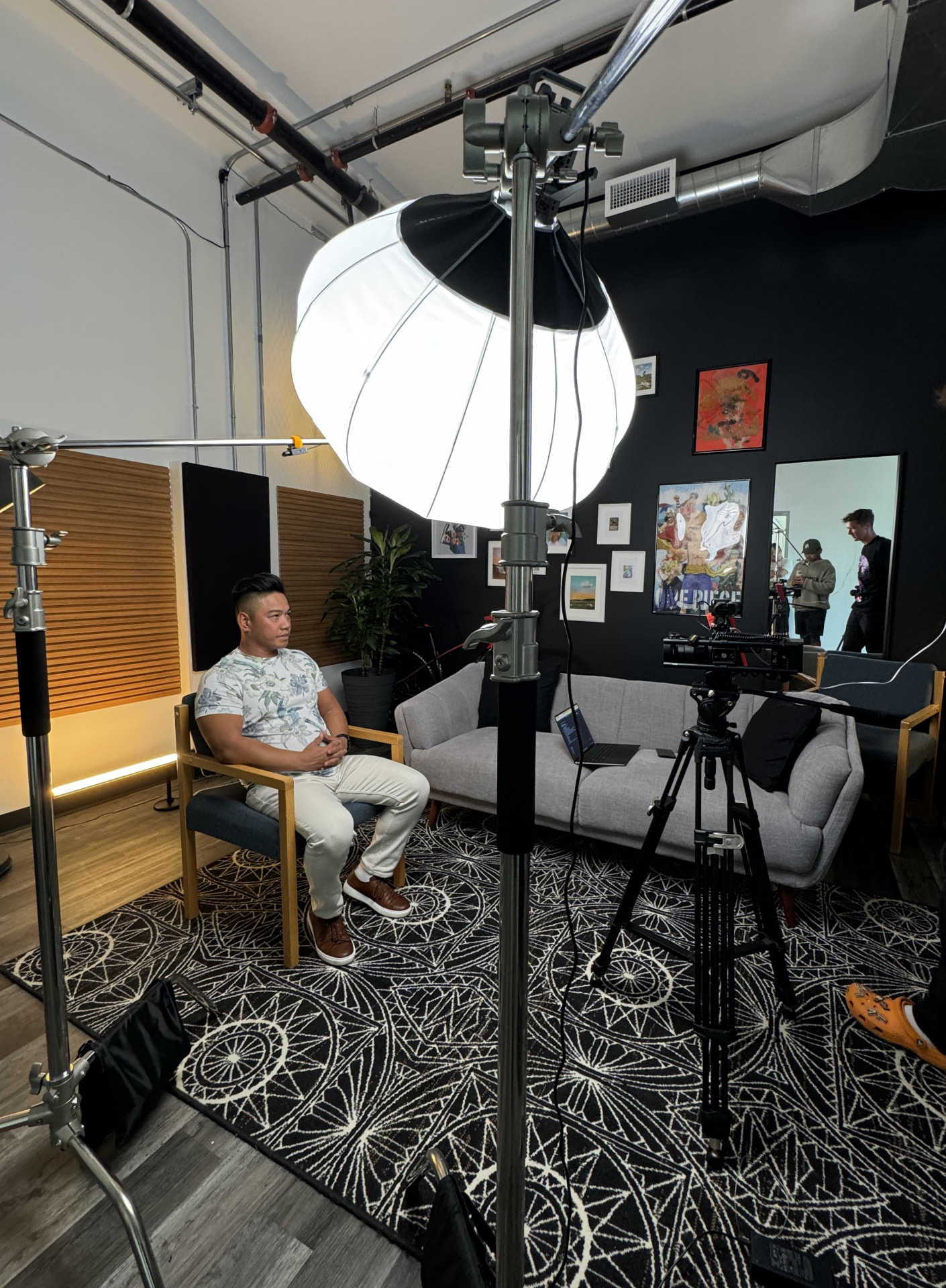 Founder on camera in a loft studio shoot